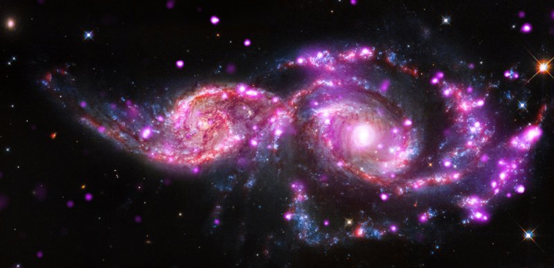 Встреча двух спиральных галактик NGC 2207 и IC 2163